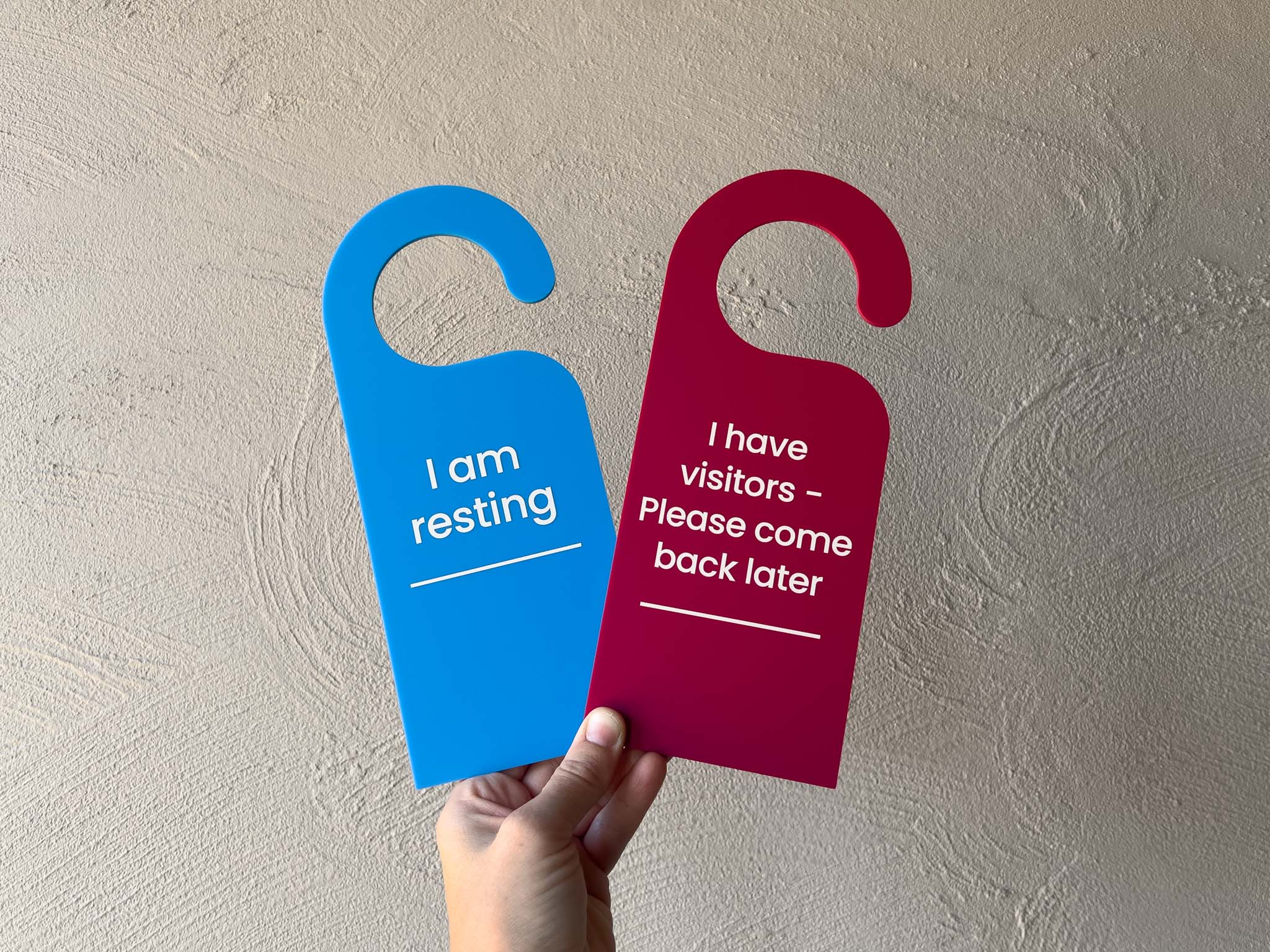 Custom printed acrylic door hangers that read "I am resting" & "I have visitors - Please come back later".
