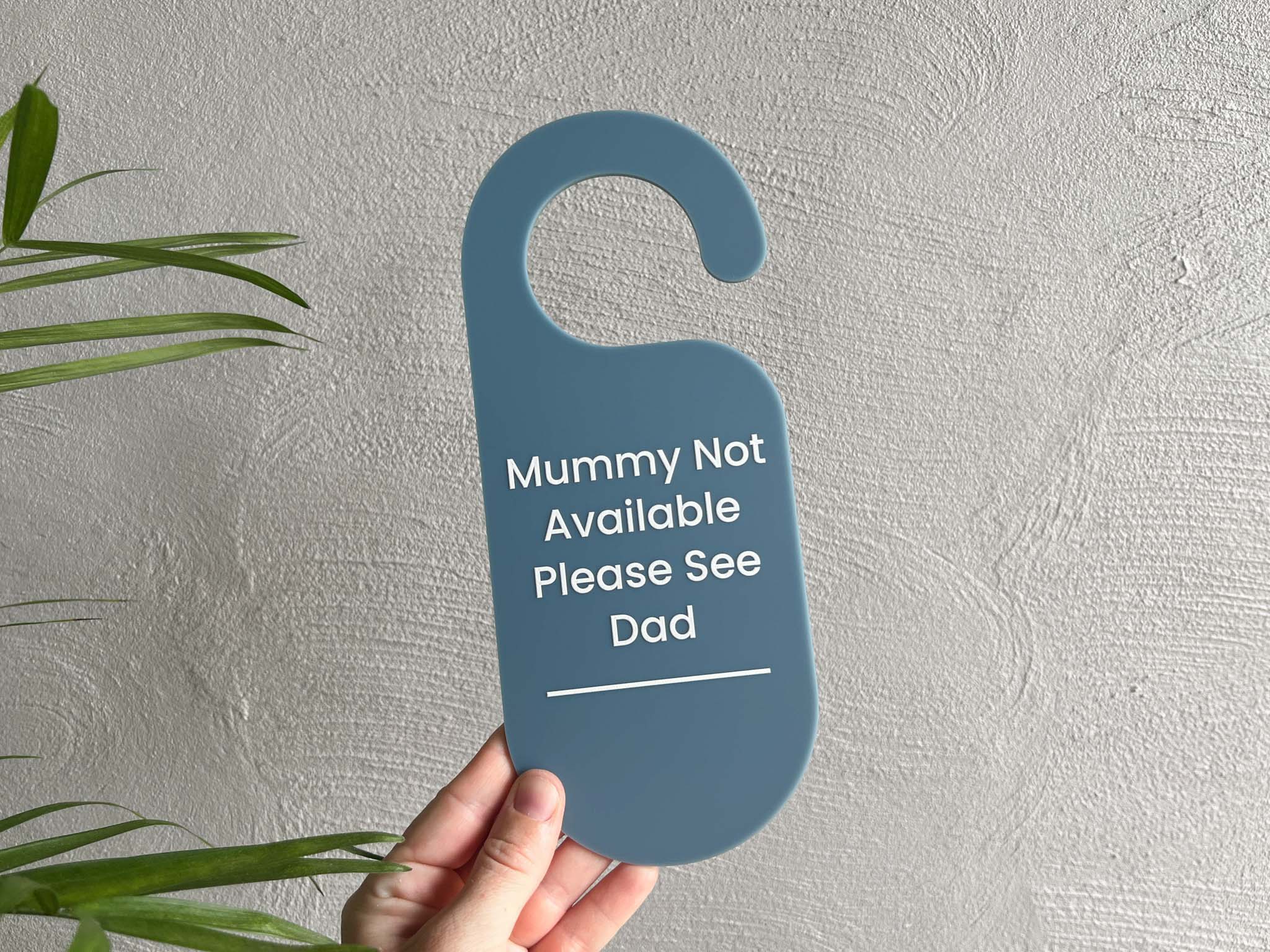 Custom printed acrylic door hanger "Mummy Not Available Please See Dad" in a smoky, dusty blue colour.
