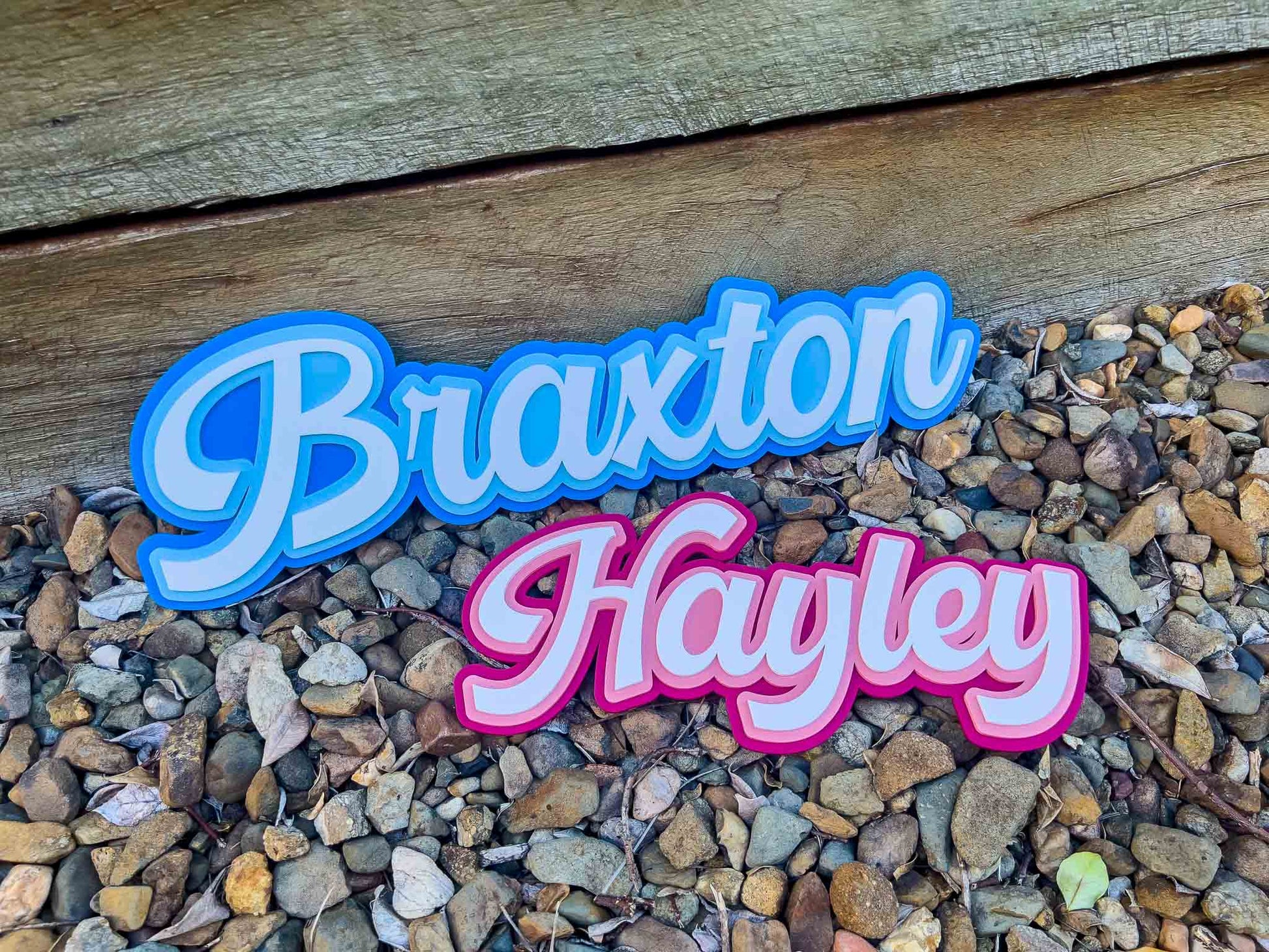 Colourful 3D acrylic name plaques 'Braxton' and 'Hayley' for children's bedrooms.