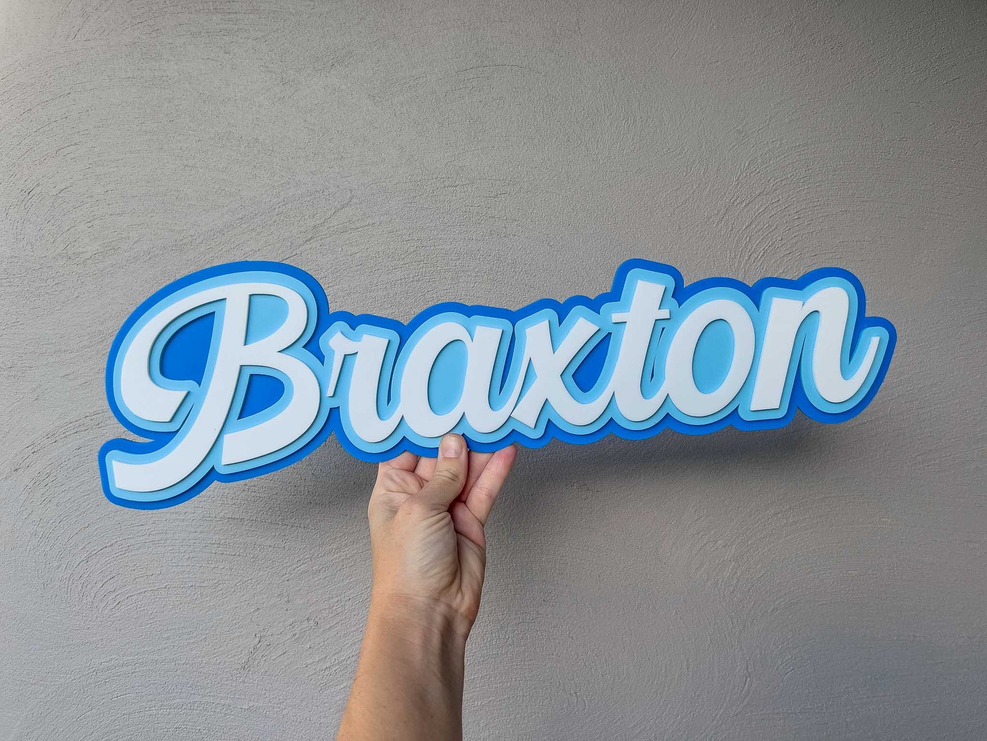 Iconic retro style 3D name plaque 'Braxton' in surf blue colours.