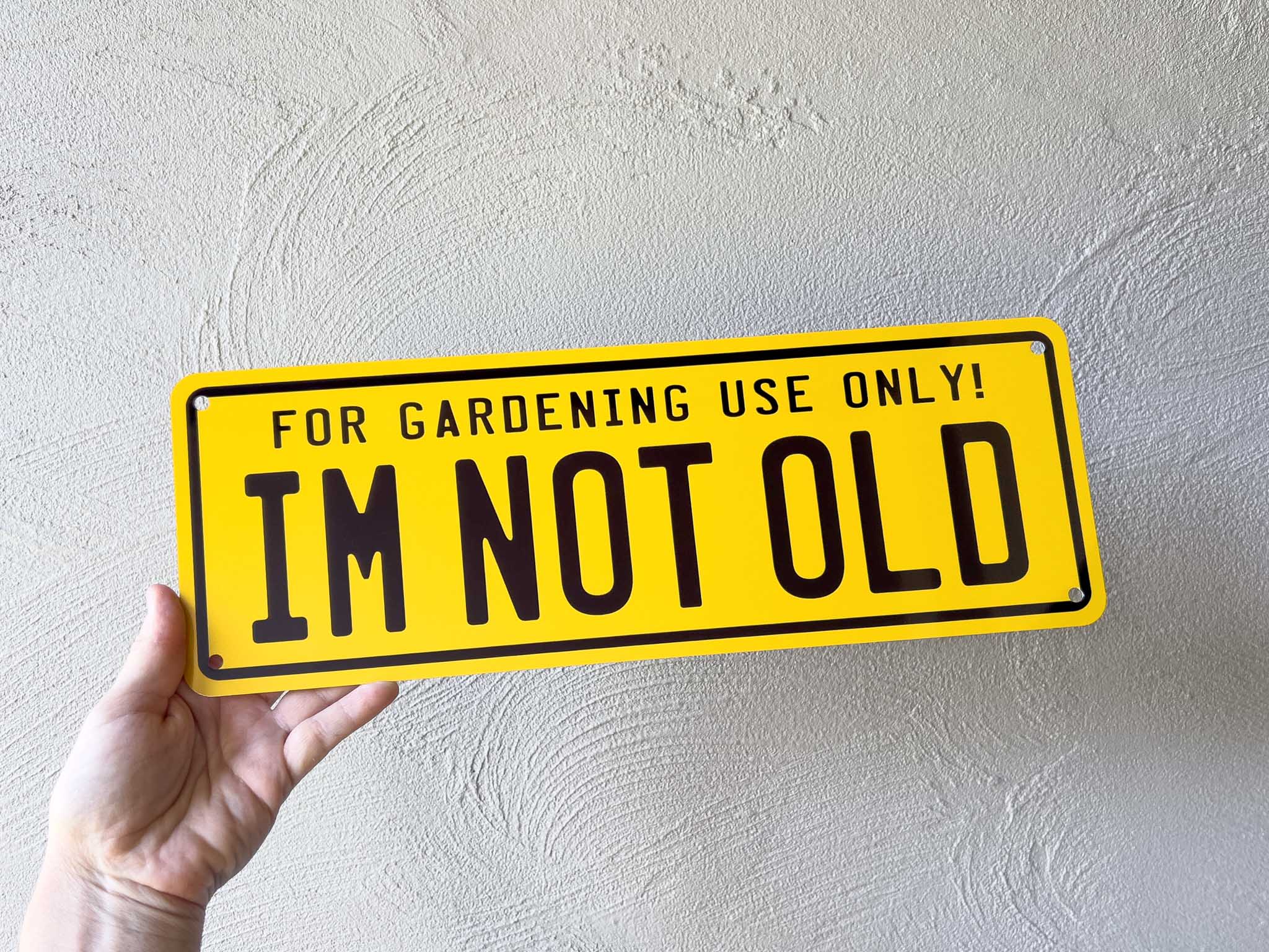 Custom printed yellow and black number plates style sign that says 'Im Not Old'.