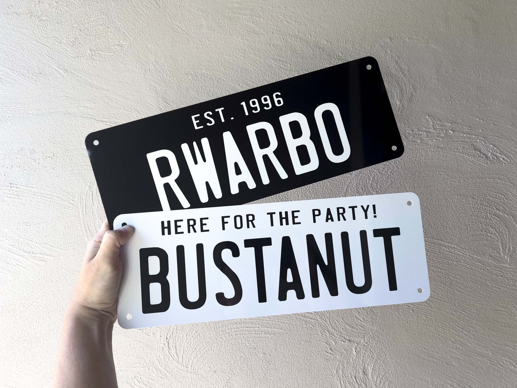 Custom printed novelty number plate display signs in black and white