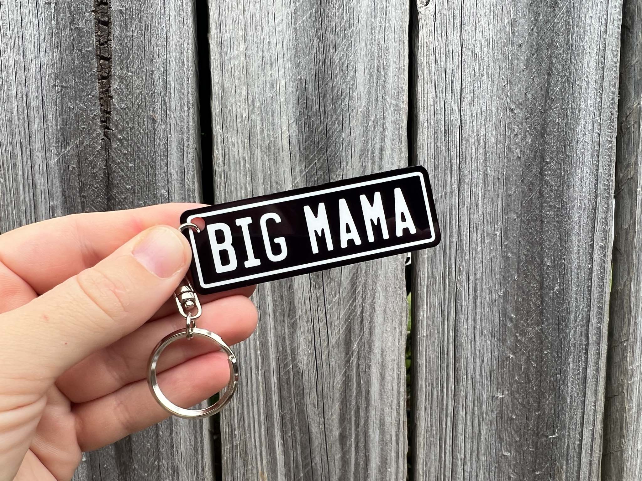 Personalised number plate keychain that reads 'BIG MAMA' in black and white.