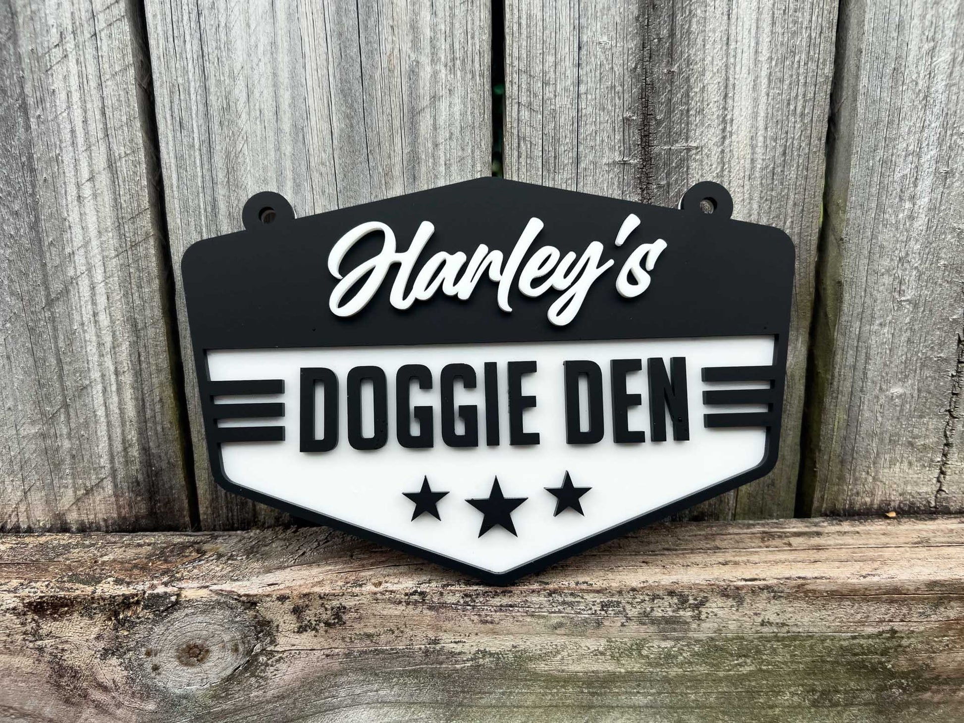 Personalized pet sign with 'Harley's Doggie Den' on a wooden background | Coji Designs