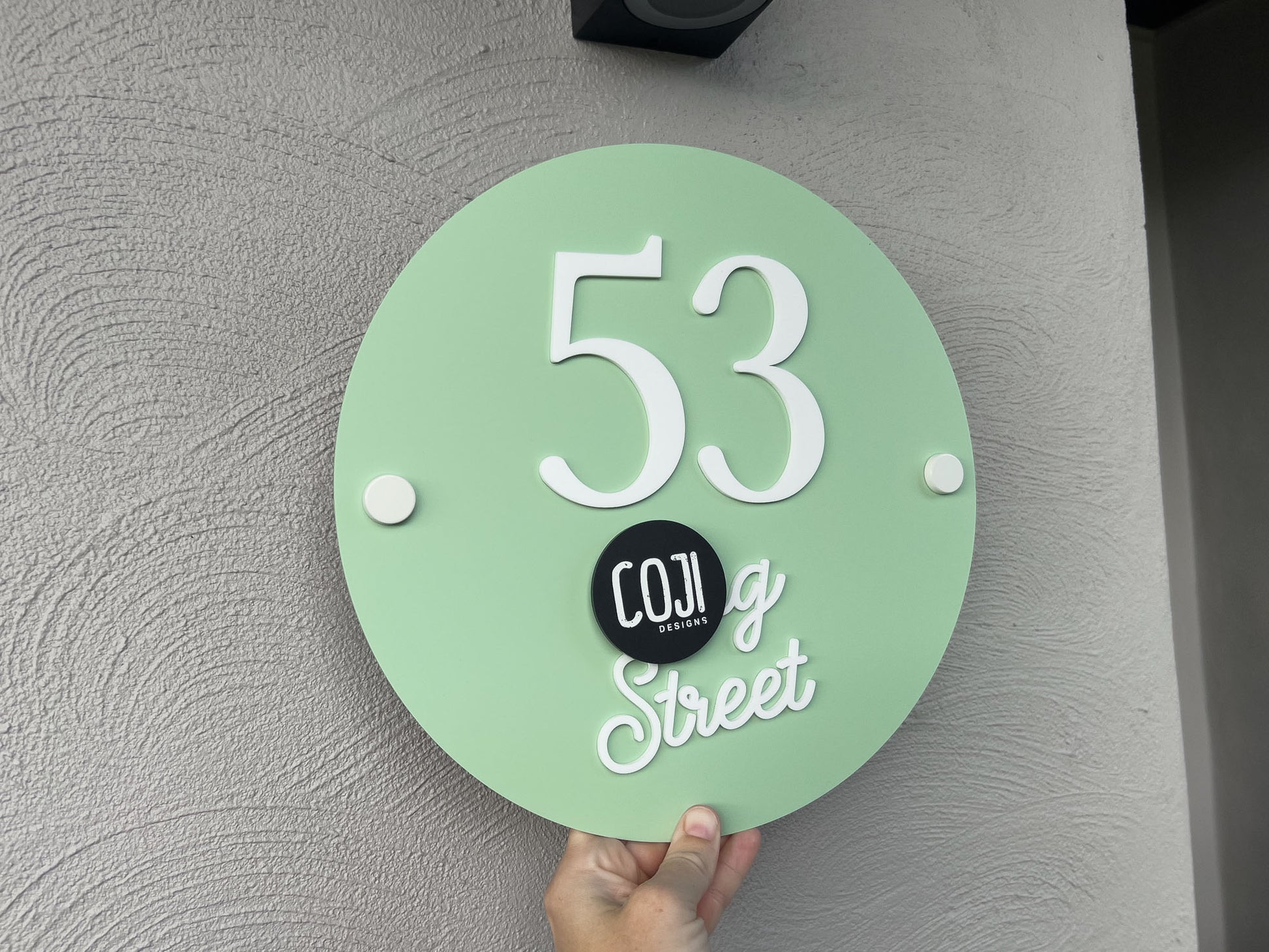 Pistachio green and white custom handmade American vintage style street address sign that says '53 Street'.