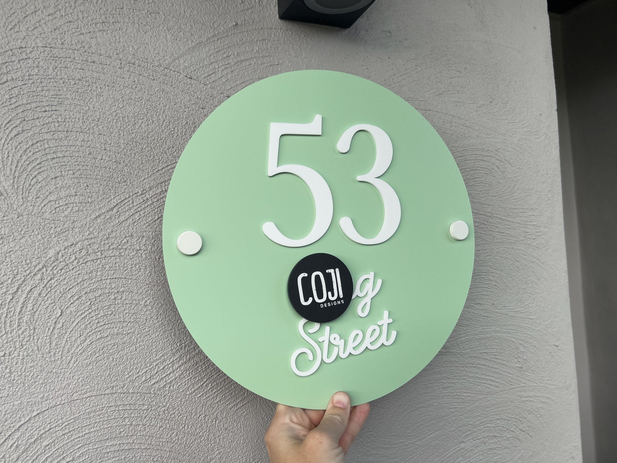 Pistachio green and white custom handmade American vintage style street address sign that says '53 Street'.