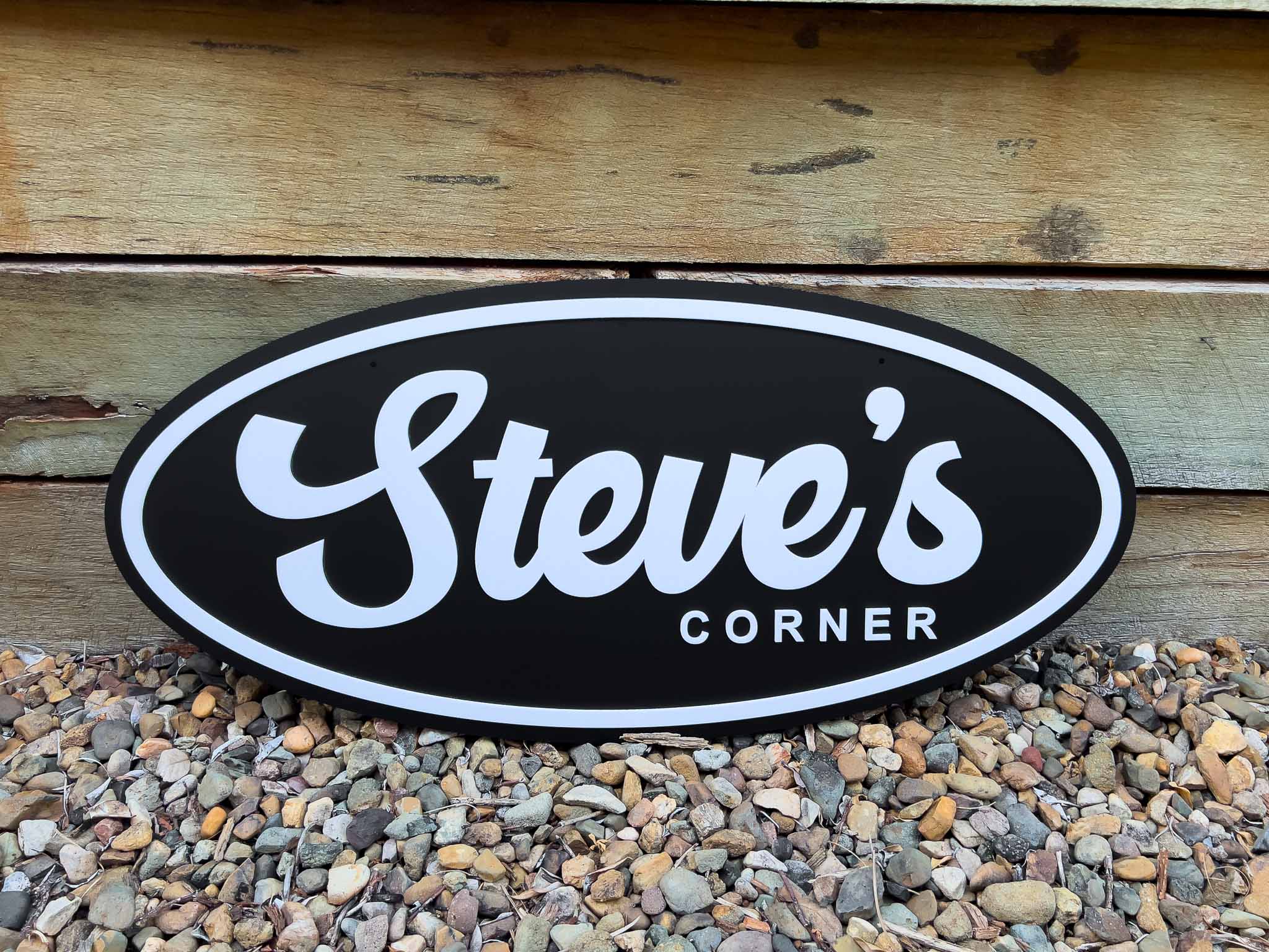 Personalised 3D acrylic retro sign that says 'steve's Corner' in black and white