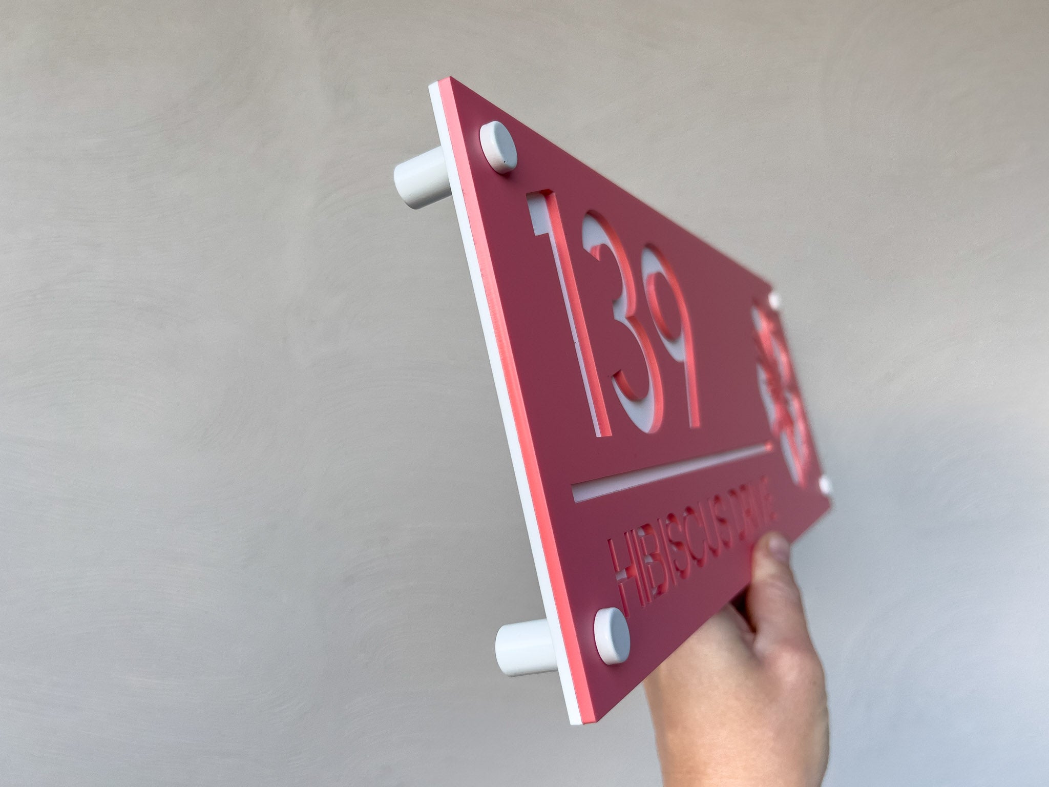Side view or the Honolulu hibiscus flower address sign