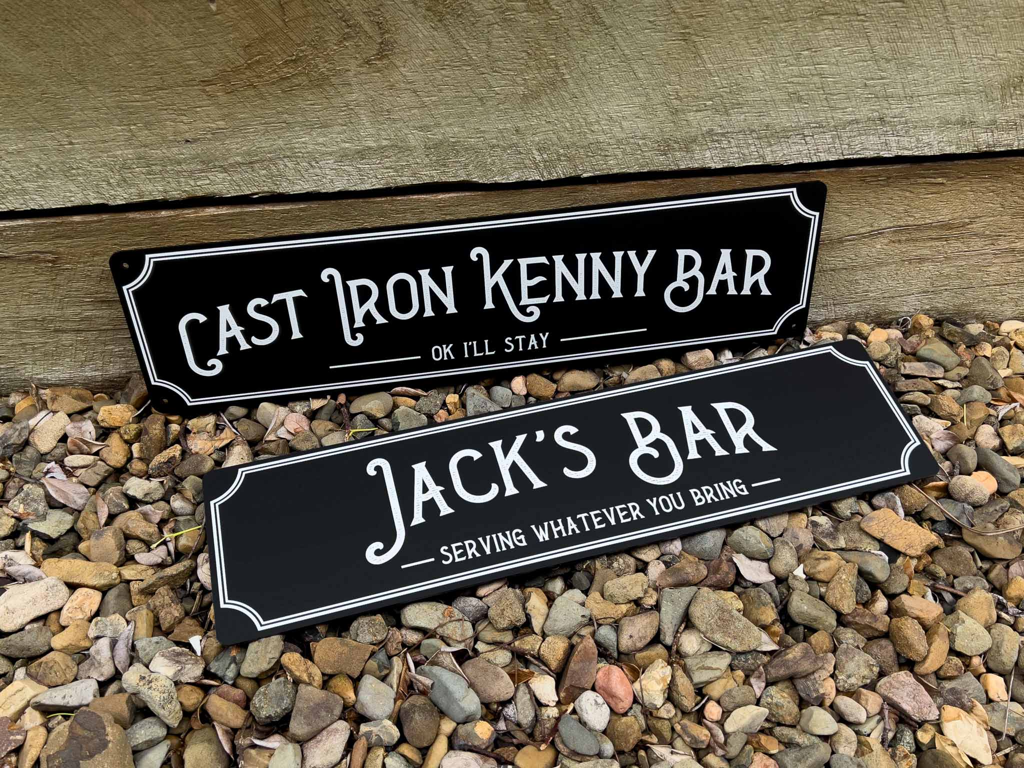 Two custom printed black and white signs for a nostalgic vintage style bar