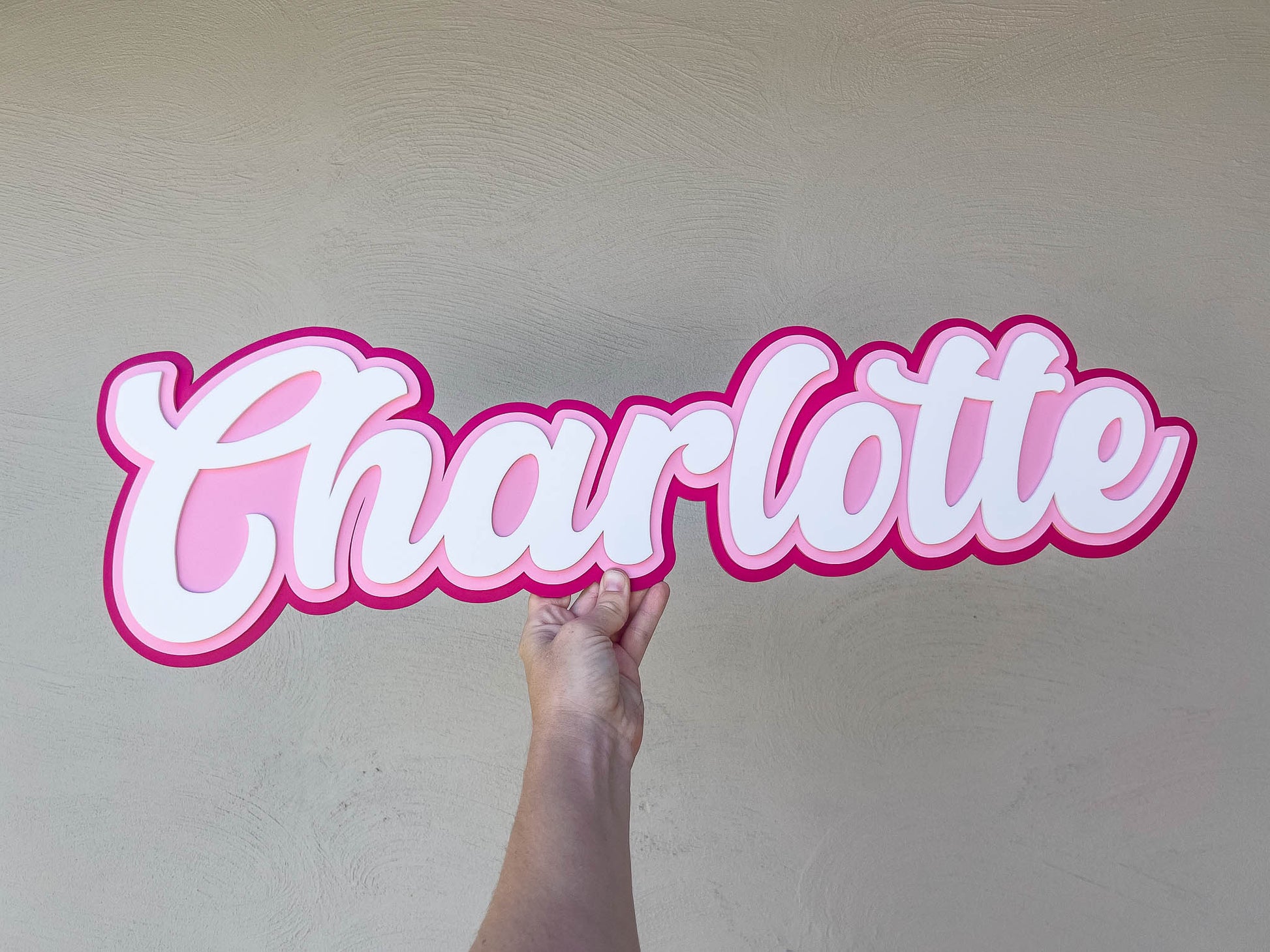 Classic 'Charlotte' 3D layered name plque in dark pink, light pink and white.