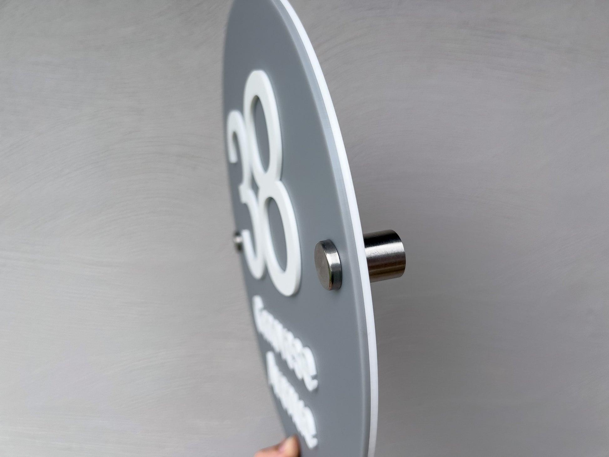 The side of a personalised Memphic classic address sign made by Coji Designs.