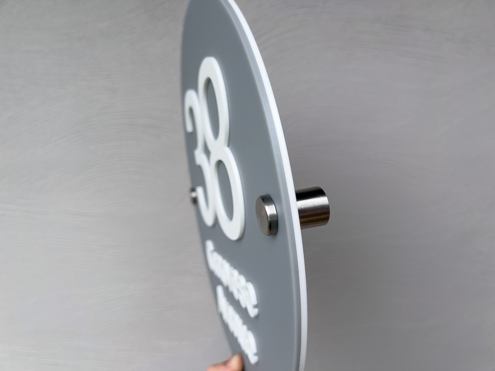 The side of a personalised Memphic classic address sign made by Coji Designs.