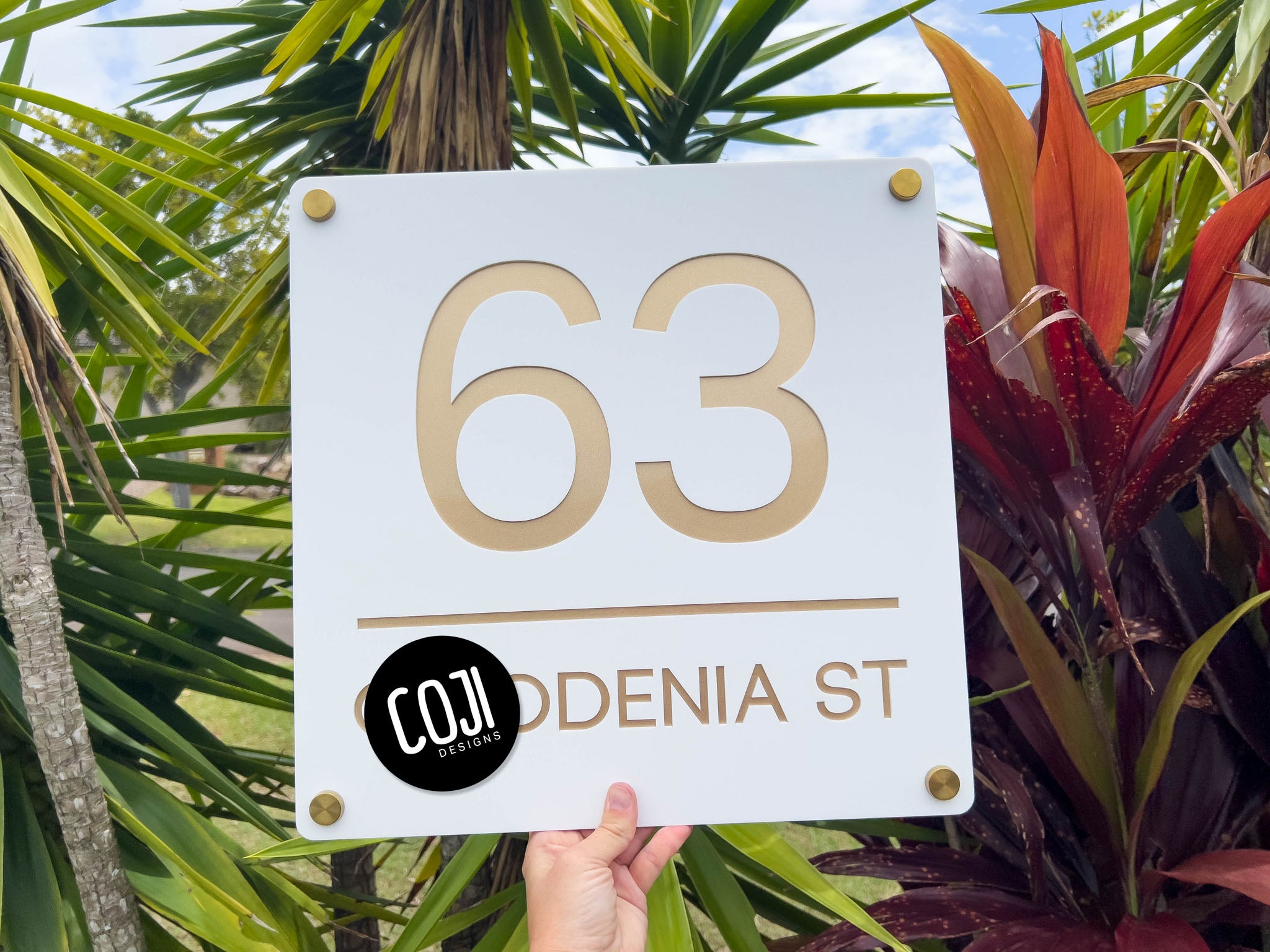 Beautiful classic white and metallic gold large number address sign