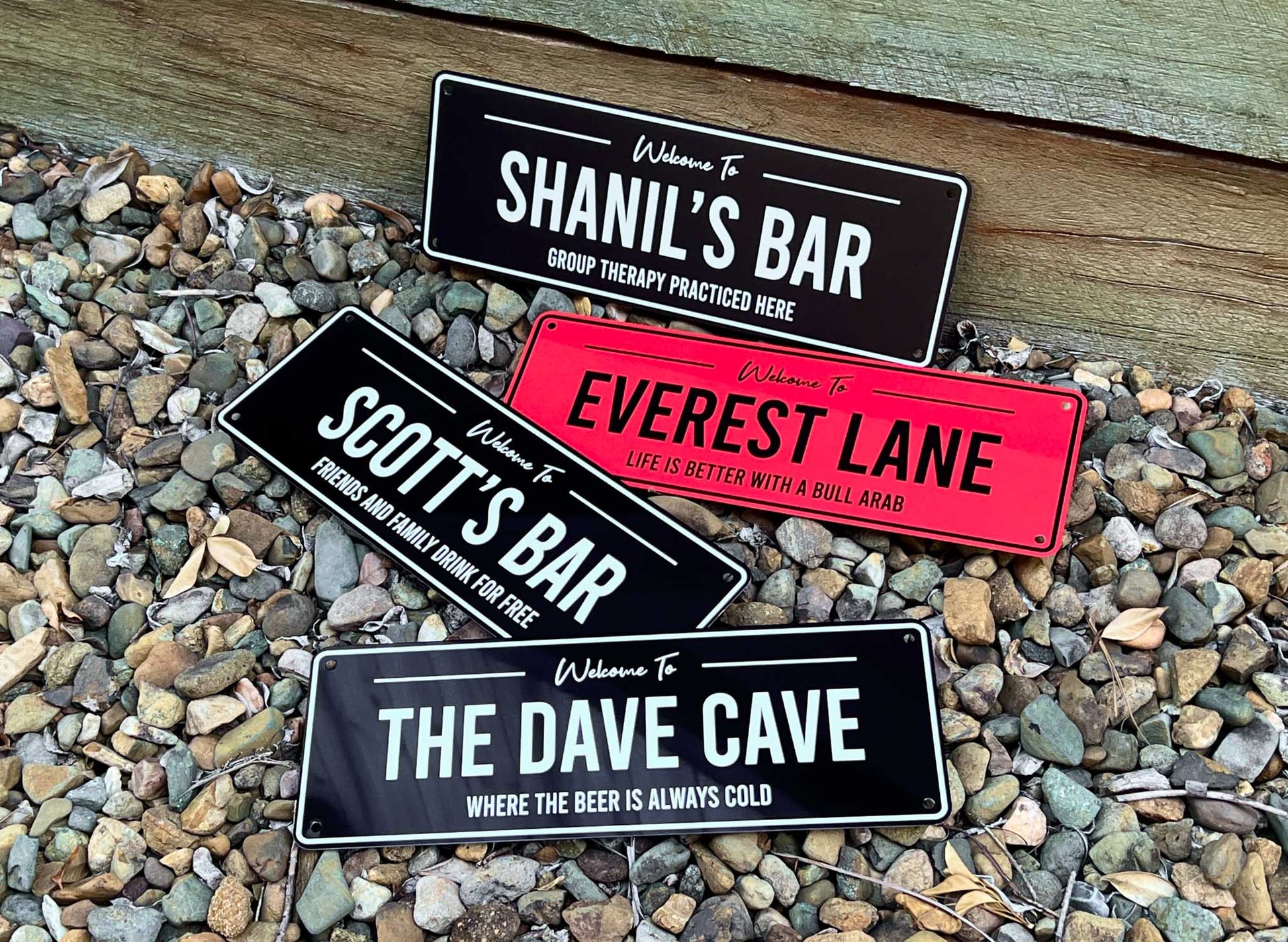 Four custom printed aluminium bar sign panels in black, white and red.