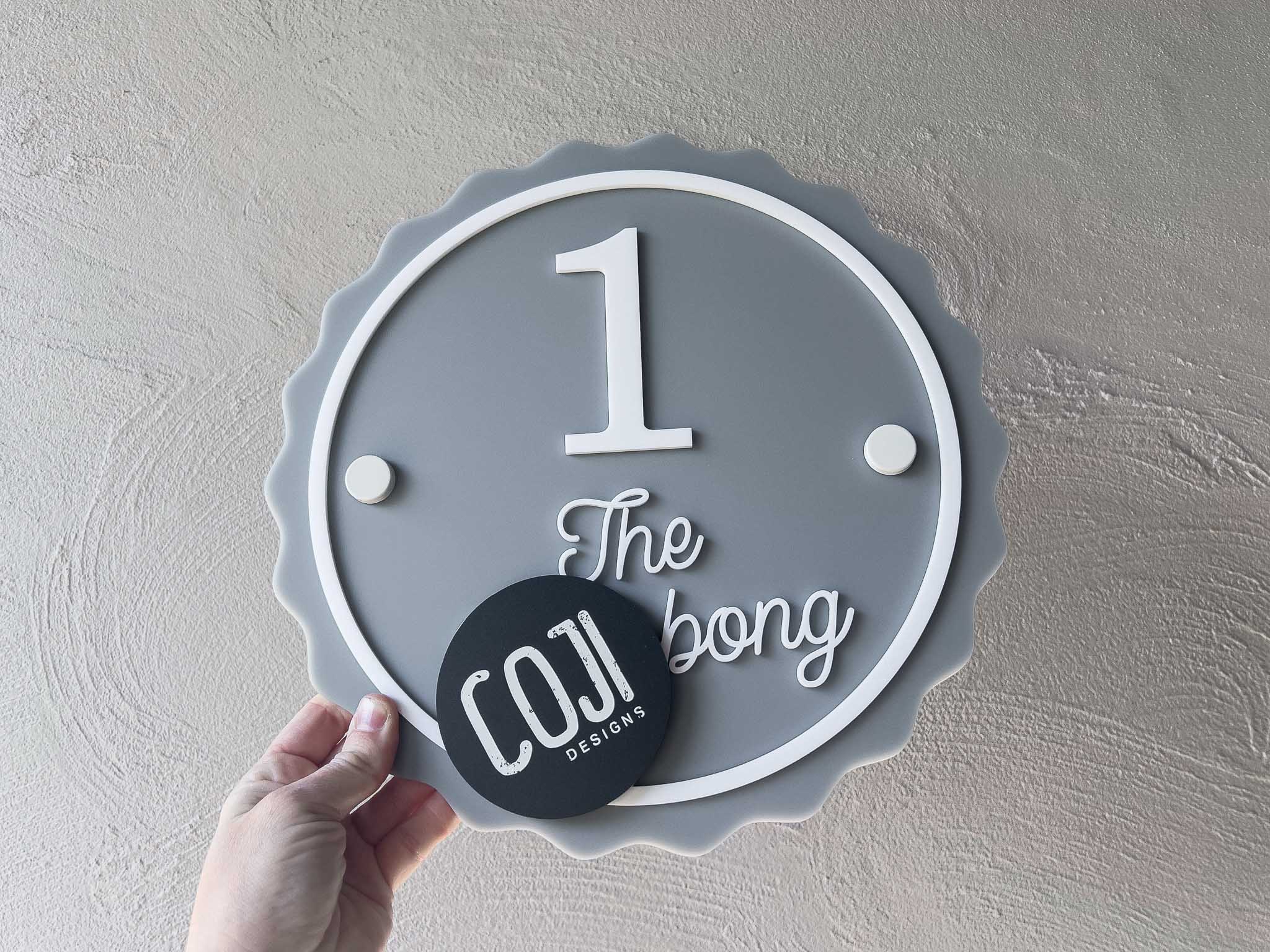 Personalised 3D acrylic house address sign custom made in grey and white with the number '1'.
